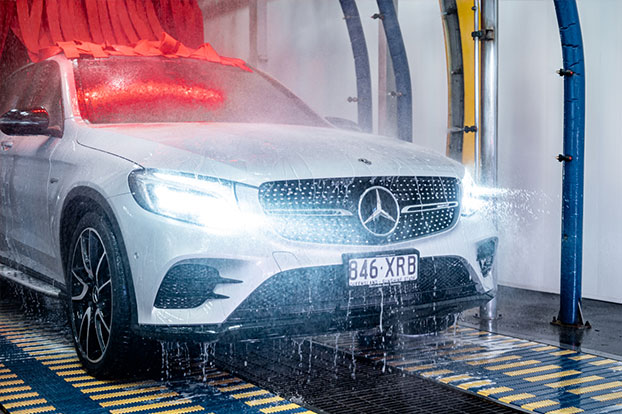 mercedes driving through tunnel car wash